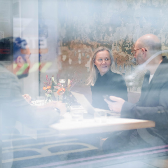 Office of Redbox, employees gather around the table